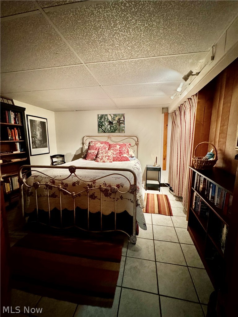 123 E Road Toronto, OH 43964 - Photo 19 of 34 Tiled bedroom with a drop ceiling