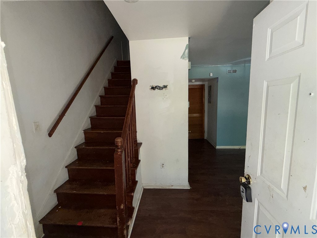 1607 Old Iron Road Hopewell, VA 23860 - Photo 2 of 12 a view of entryway with wooden floor and stairs