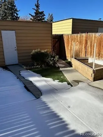 a view of a back yard of the house