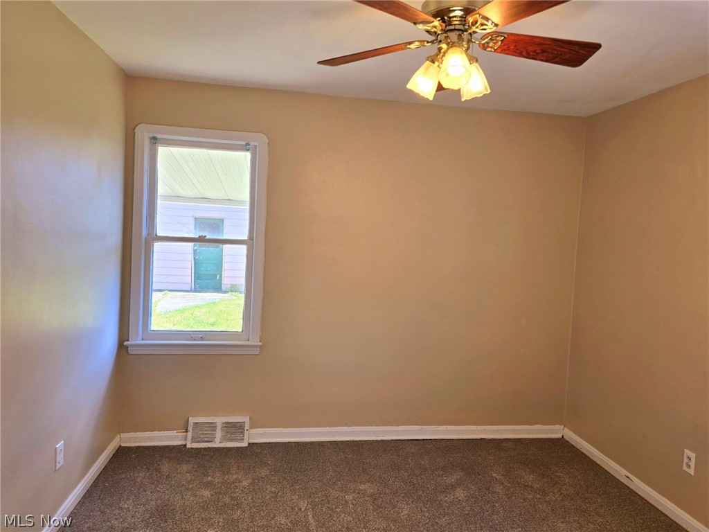 4111 Redfern Road Parma, OH 44134 - Photo 11 of 40 Bedroom featuring carpet and ceiling fan