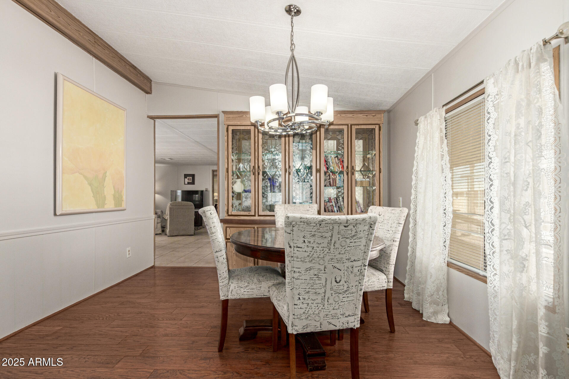 301 South Signal Butte Road, Unit 706 Apache Junction, AZ 85120 - Photo 13 of 48 a dining room with furniture and window