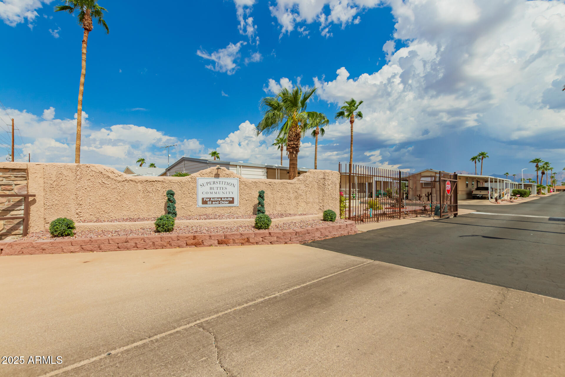 301 South Signal Butte Road, Unit 706 Apache Junction, AZ 85120 - Photo 39 of 48 a street view with large building