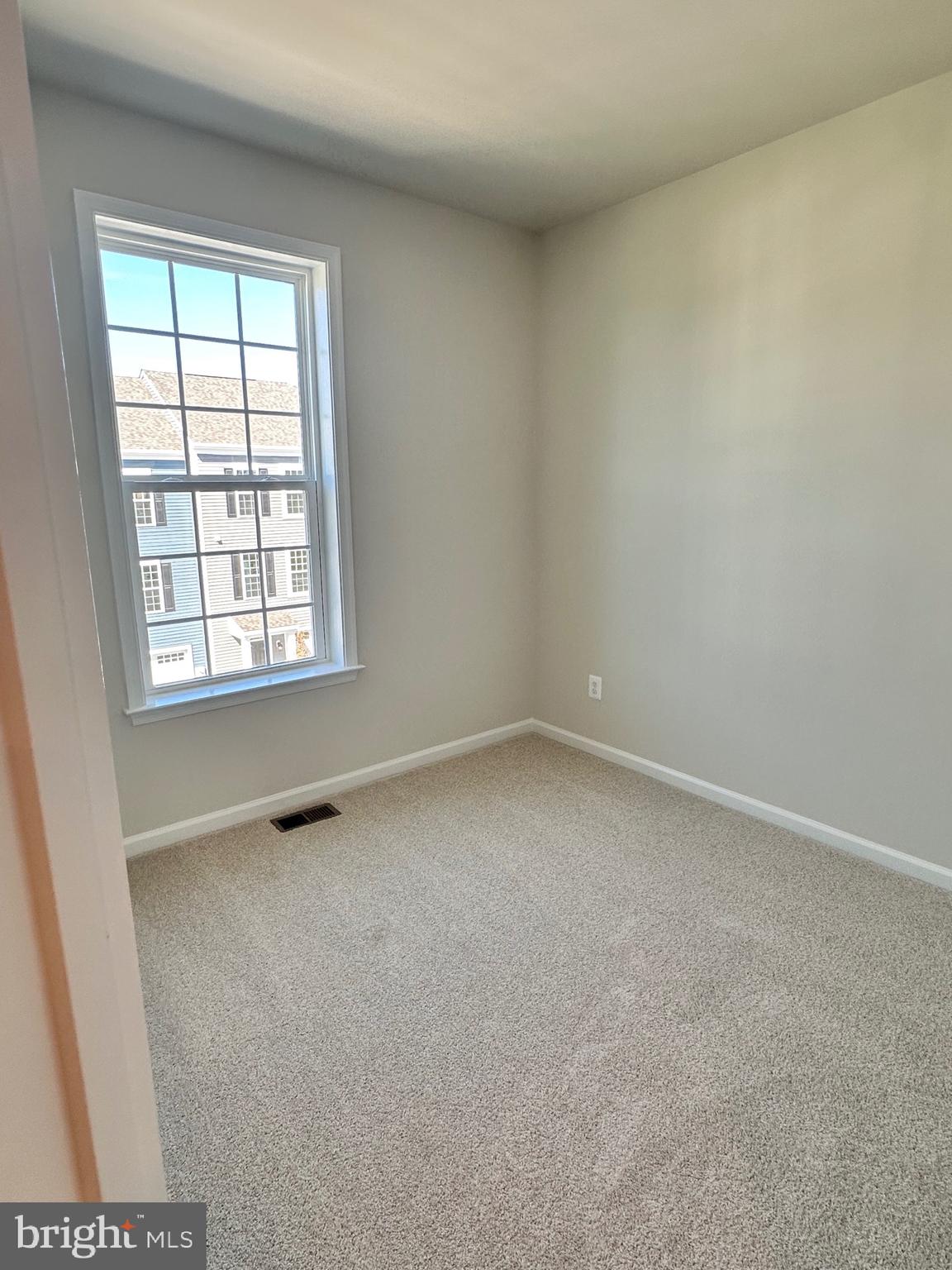 108 Spring Bank Way Frederick, MD 21701 - Photo 14 of 19 an empty room with a window