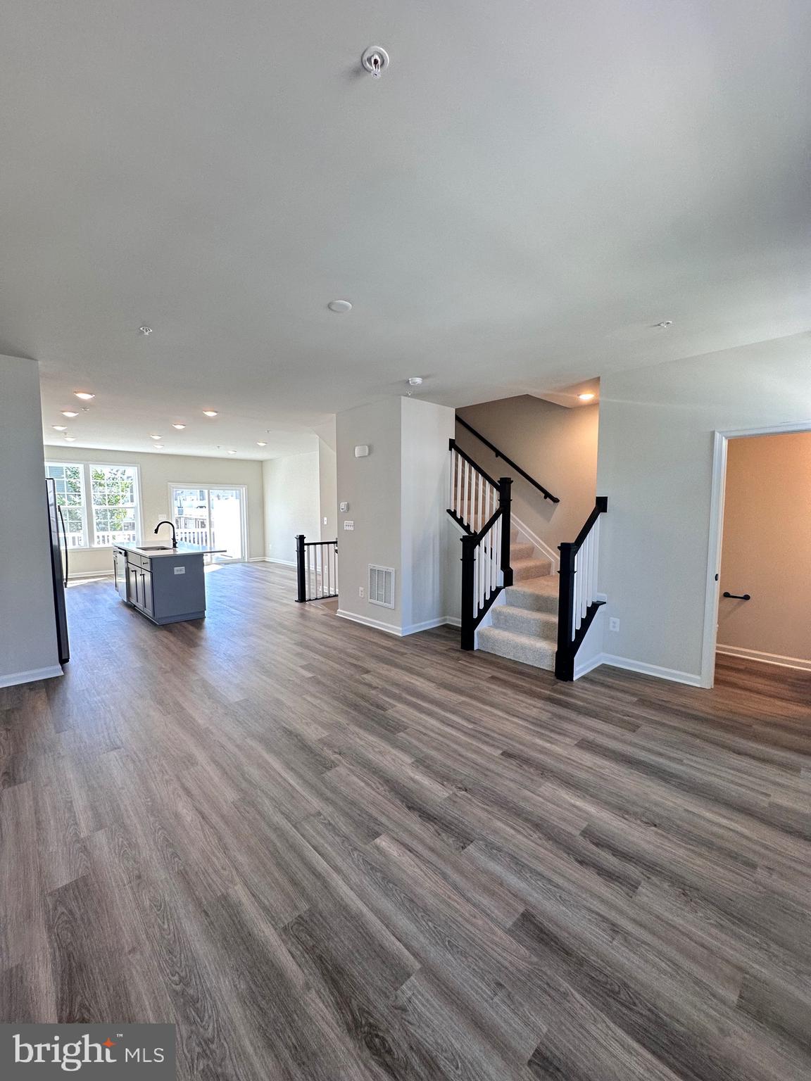 108 Spring Bank Way Frederick, MD 21701 - Photo 8 of 19 a view of a living room filled with furniture
