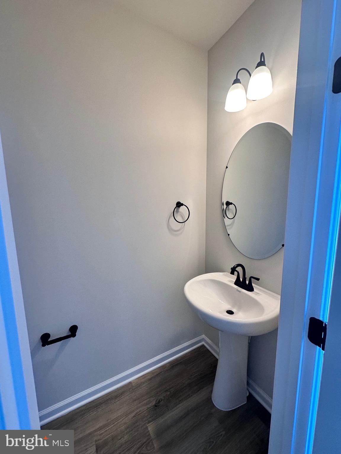 108 Spring Bank Way Frederick, MD 21701 - Photo 9 of 19 a bathroom with a sink toilet and mirror