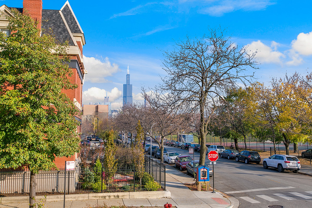 1500 West Monroe Street, Unit 225 Chicago, IL 60607 - Photo 22 of 23 a view of city street with parked cars