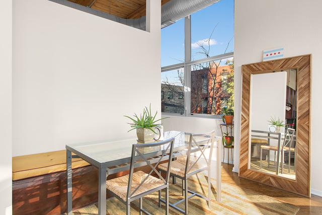 1500 West Monroe Street, Unit 225 Chicago, IL 60607 - Photo 8 of 23 a view of entryway and hall with wooden floor