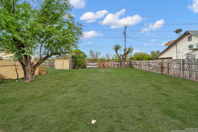 a view of a backyard with a garden