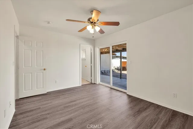 a bathroom with a sink toilet vanity and bathtub