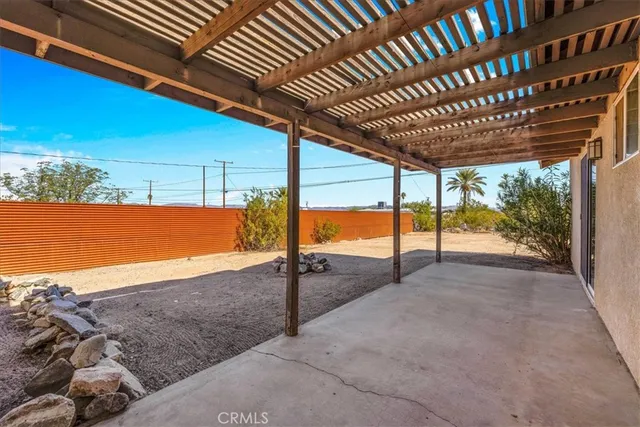 an aerial view of a house with a yard and a garden