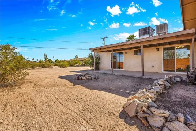an aerial view of residential building and ocean view