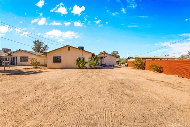 an aerial view of residential building and ocean view