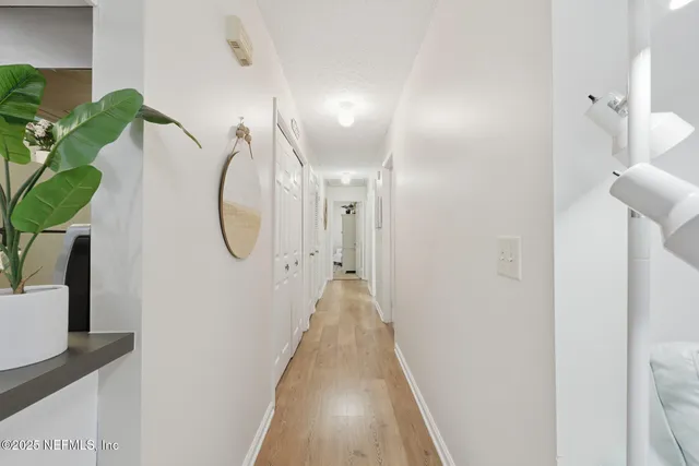 a bedroom with a bed and a closet