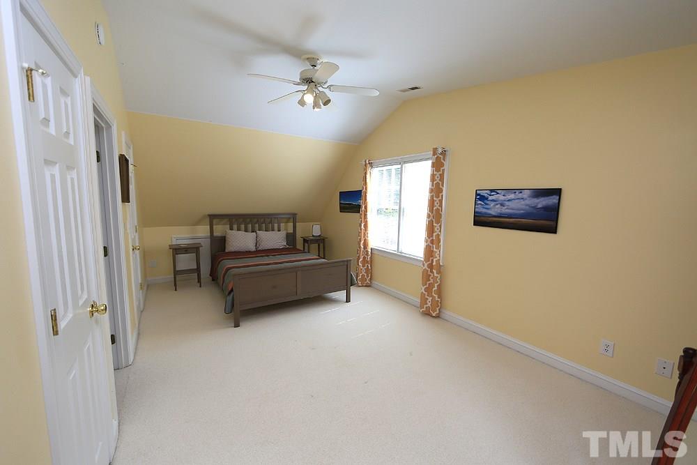 4008 Skipjack Court Raleigh, NC 27613 - Photo 15 of 21 a living room with furniture and a window
