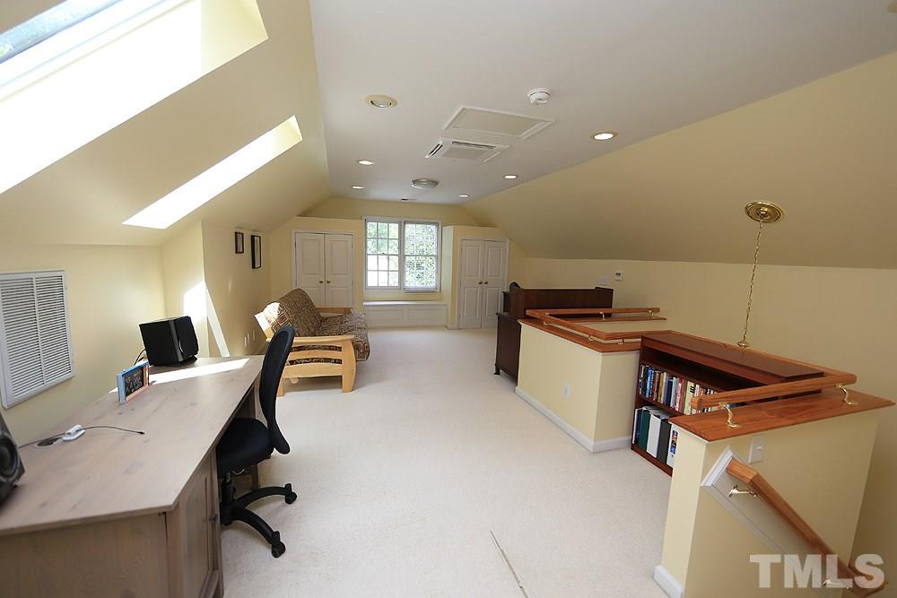 4008 Skipjack Court Raleigh, NC 27613 - Photo 17 of 21 a view of a workspace with furniture and a window
