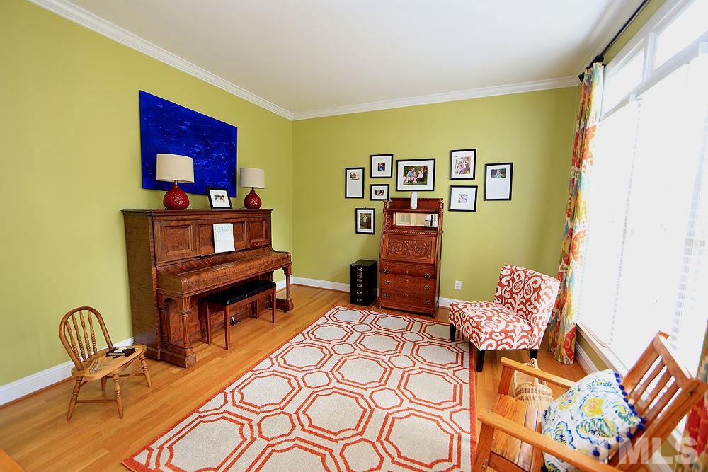 4008 Skipjack Court Raleigh, NC 27613 - Photo 4 of 21 a living room with furniture and a window