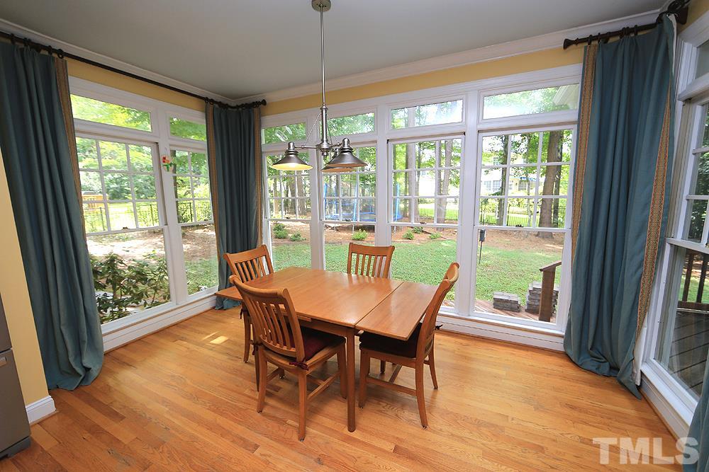 4008 Skipjack Court Raleigh, NC 27613 - Photo 8 of 21 a dining room with furniture window wooden floor