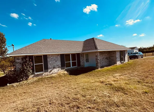 a view of an ocean and a mountain