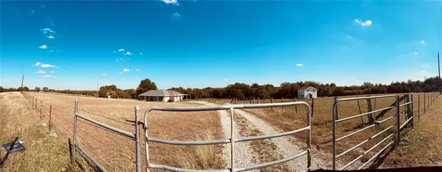 a view of a balcony with chairs