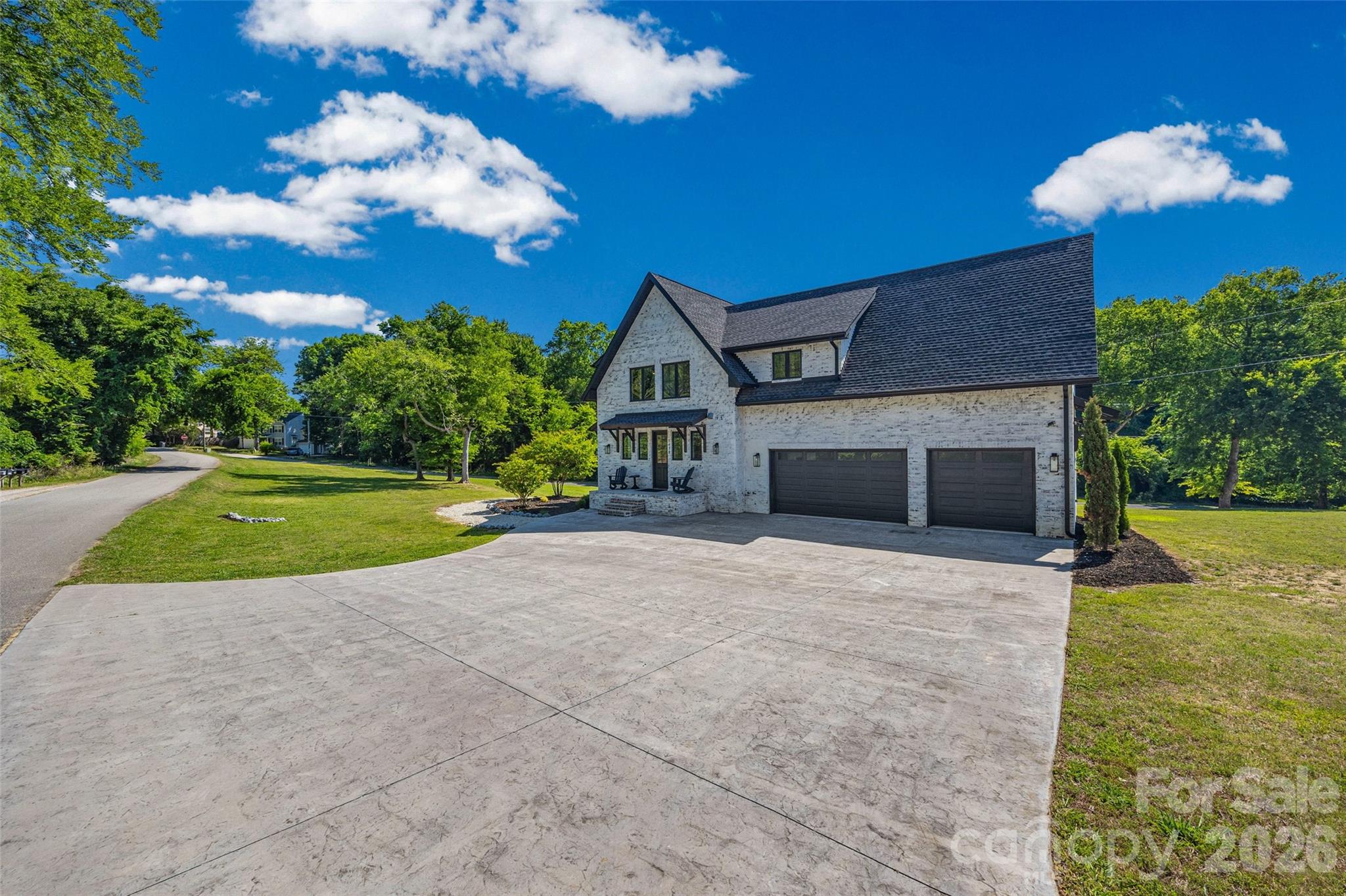 5438 Ralph Harper Lane Clover, SC 29710 - Photo 4 of 28 a view of a house with a yard and garage