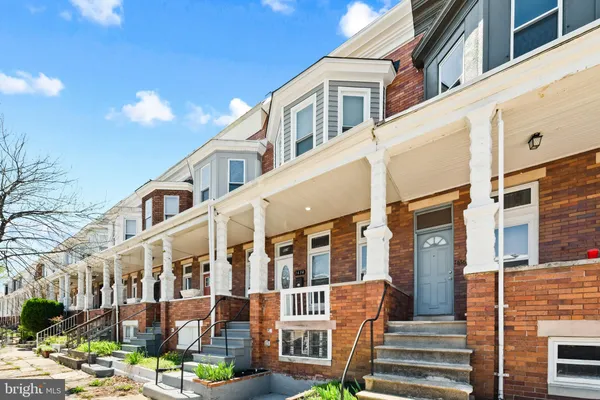 a front view of a building with street view