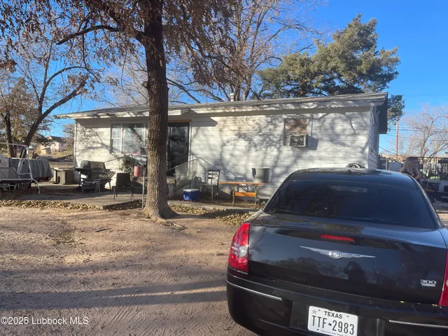 a view of street with parked cars