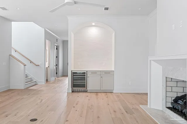 a bathroom with a sink a toilet a shower and a mirror