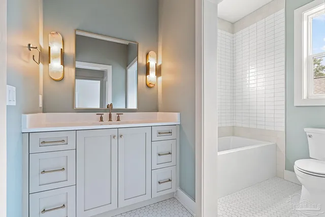 a view of an empty room with a fireplace and a fireplace