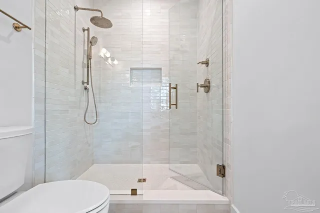 a view of a house with backyard and a tree