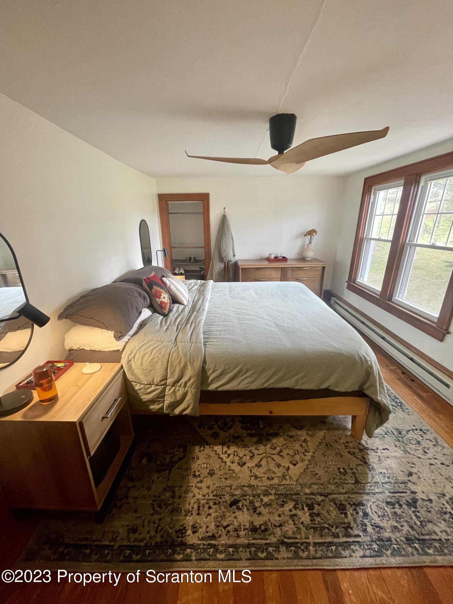 371 Bodle Road Wyoming, PA 18644 - Photo 12 of 17 a bedroom with a bed and a window