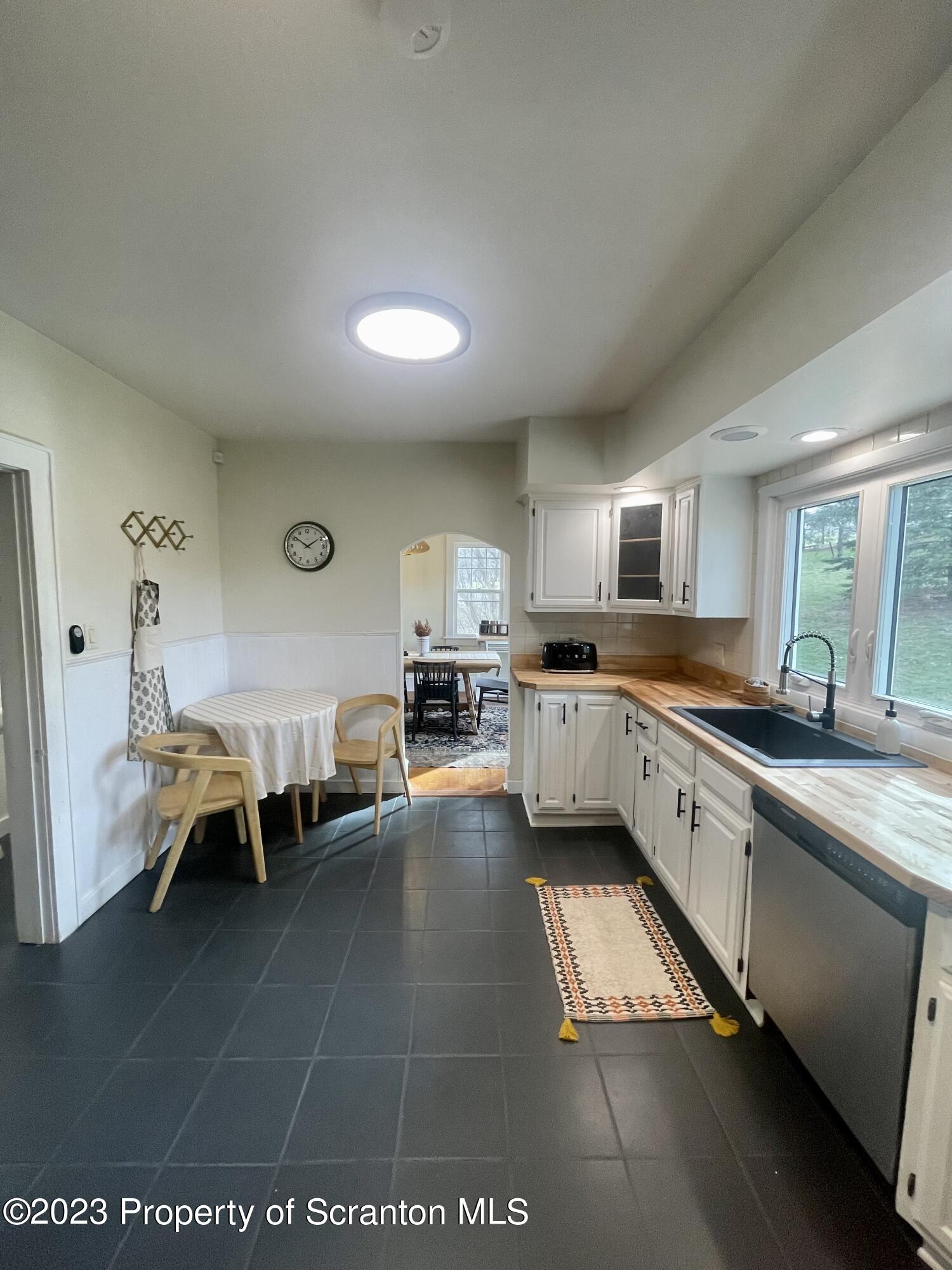 371 Bodle Road Wyoming, PA 18644 - Photo 7 of 17 a large white kitchen with lots of counter top space