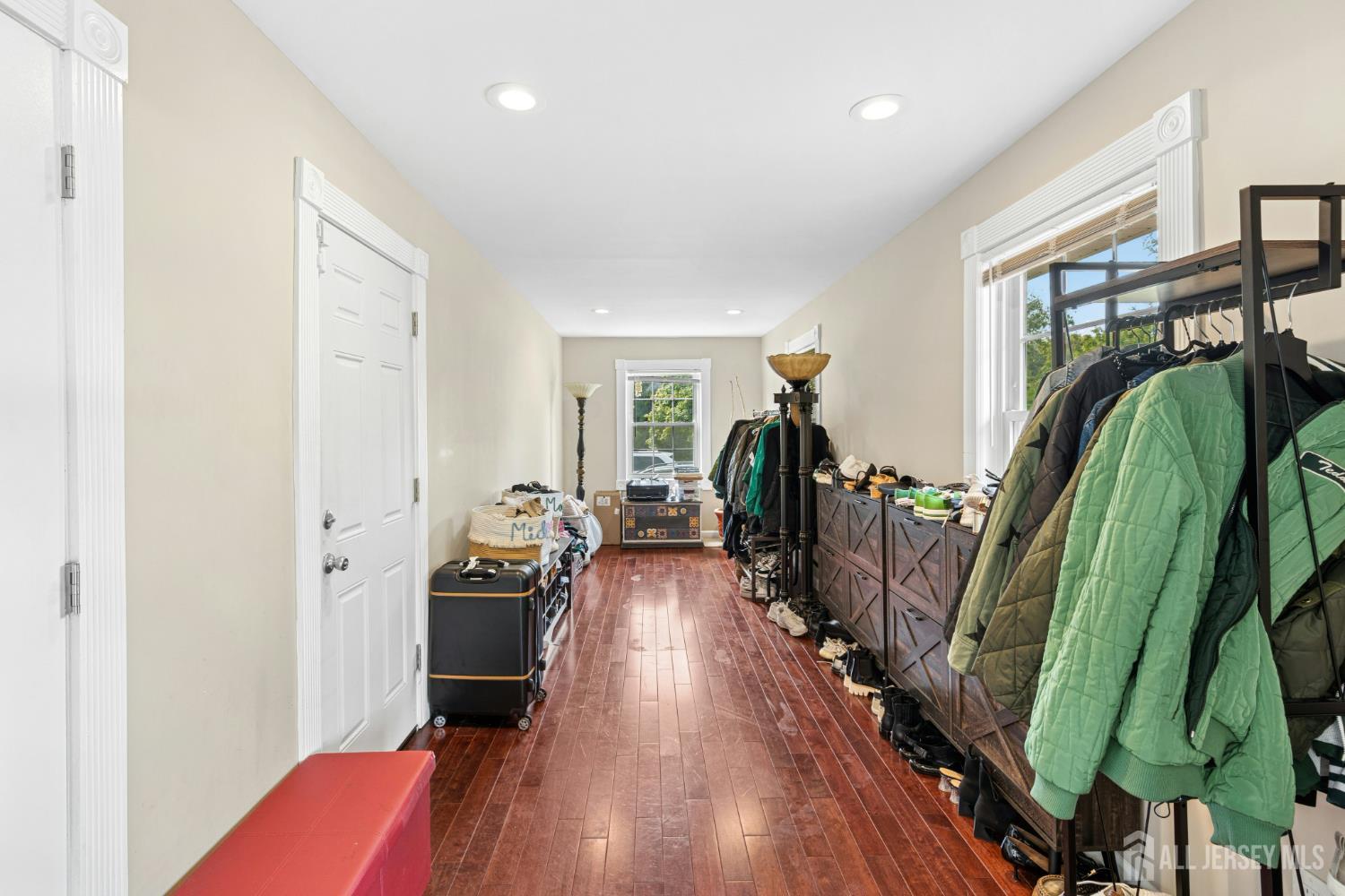 1701 Raritan Road Scotch Plains, NJ 07076 - Photo 13 of 31 a living room with furniture and a wooden floor