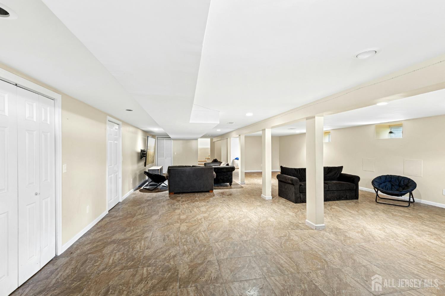 1701 Raritan Road Scotch Plains, NJ 07076 - Photo 14 of 31 a living room with furniture and a window