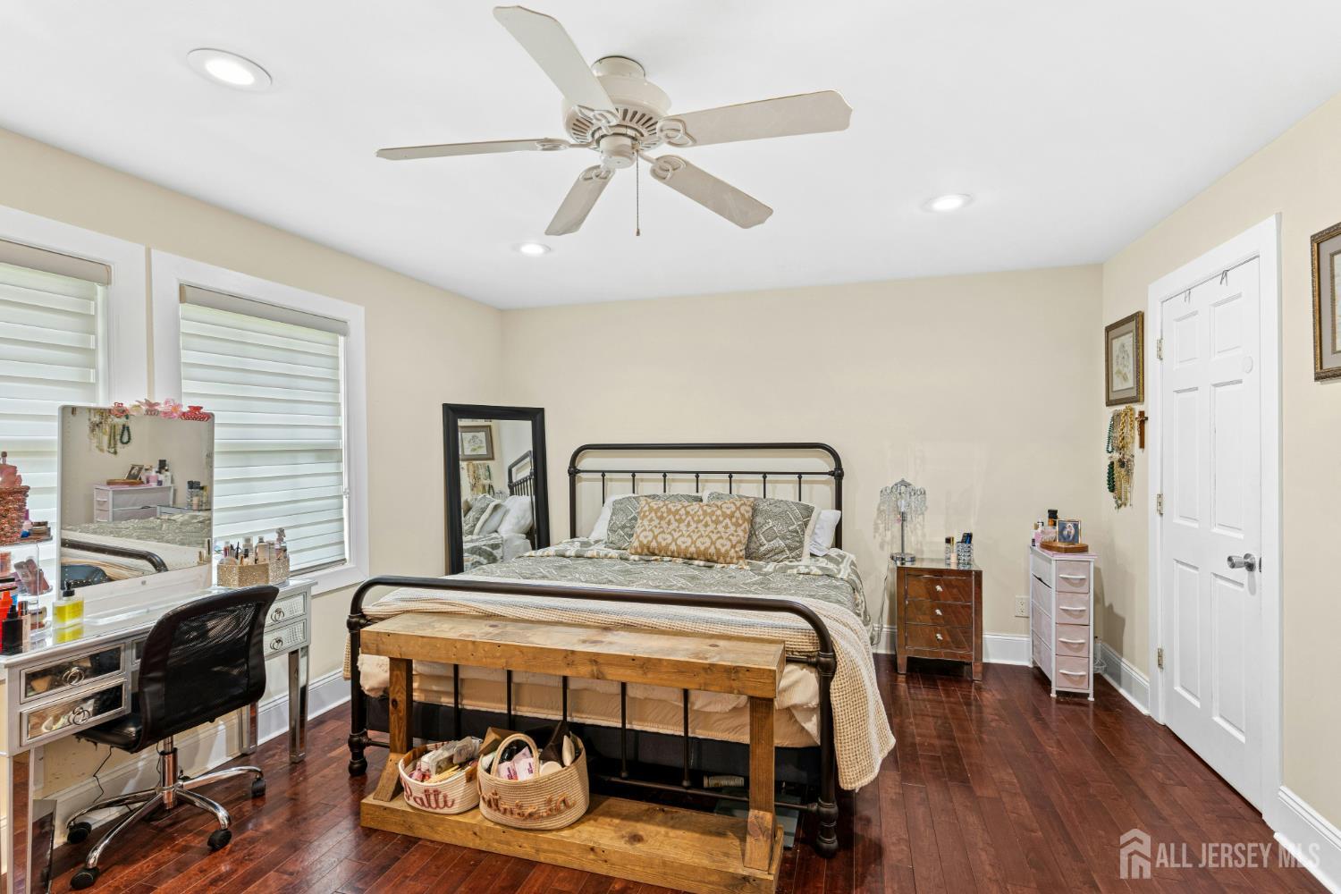1701 Raritan Road Scotch Plains, NJ 07076 - Photo 20 of 31 a bedroom with a bed a dresser and chair