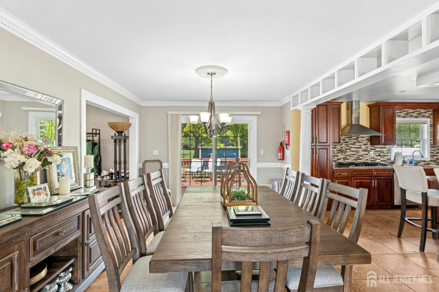 1701 Raritan Road Scotch Plains, NJ 07076 - Photo 25 of 31 a view of a dining room with furniture window and outside view