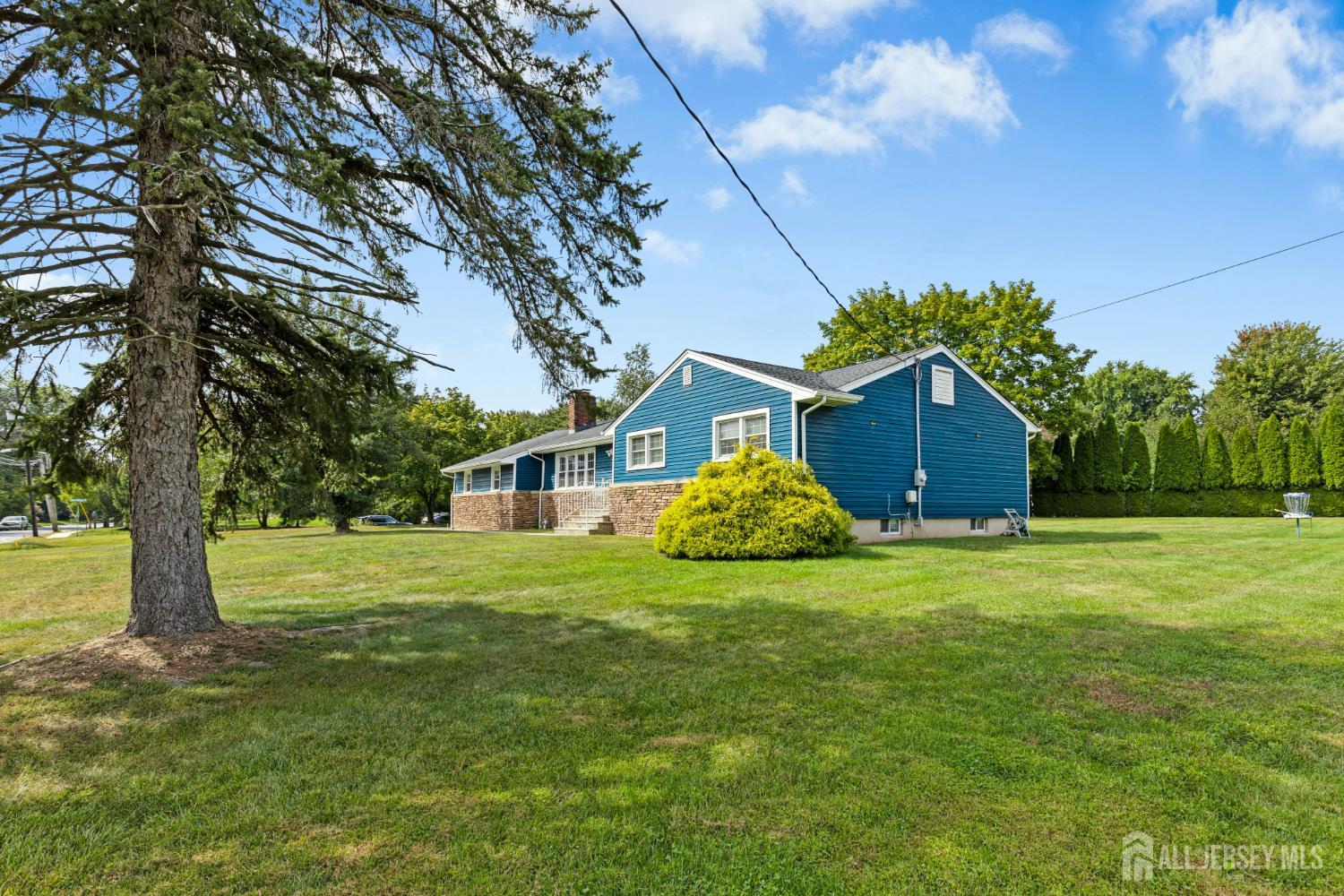1701 Raritan Road Scotch Plains, NJ 07076 - Photo 30 of 31 a front view of a house with a garden