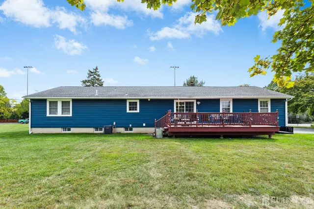 a view of a yard in front of a house