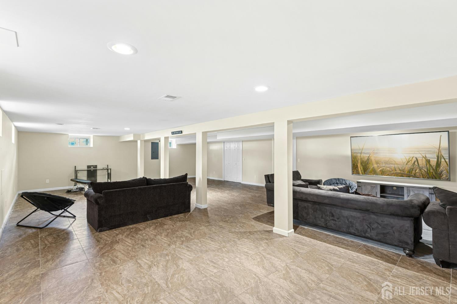 1701 Raritan Road Scotch Plains, NJ 07076 - Photo 9 of 31 a living room with furniture and a couch