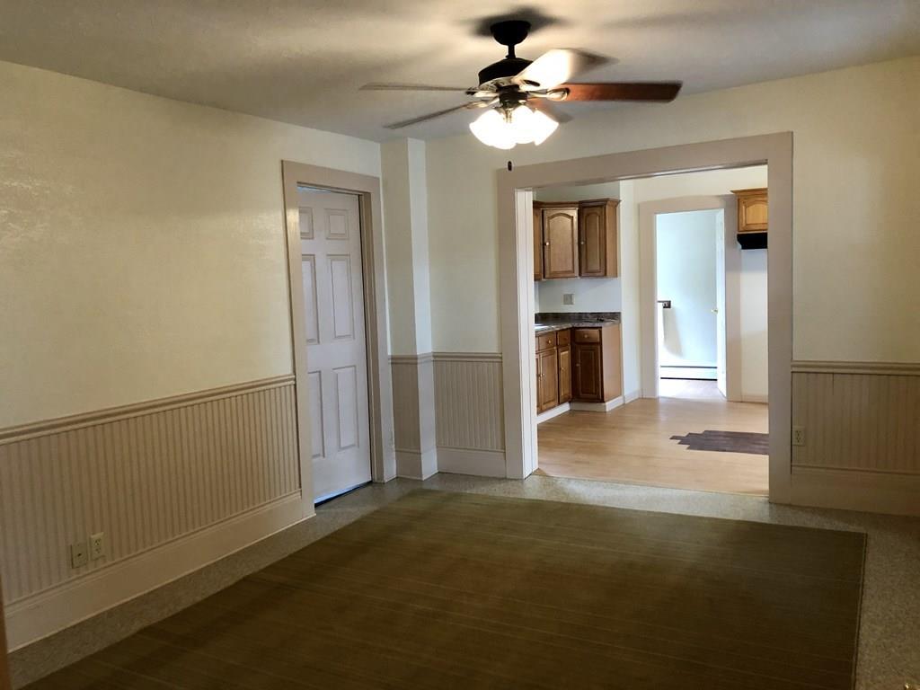 25 Baker Street Gardner, MA 01440 - Photo 12 of 26 a view of a livingroom with a flat screen tv