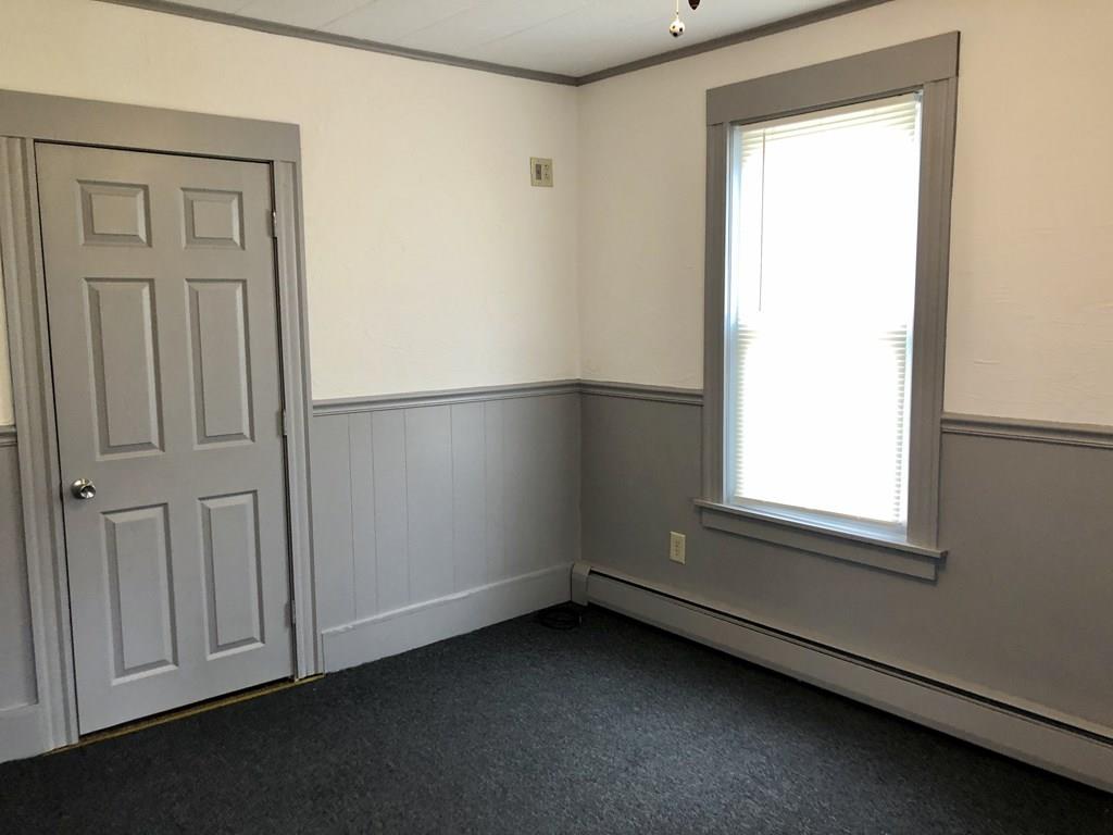 25 Baker Street Gardner, MA 01440 - Photo 15 of 26 an empty room with a window