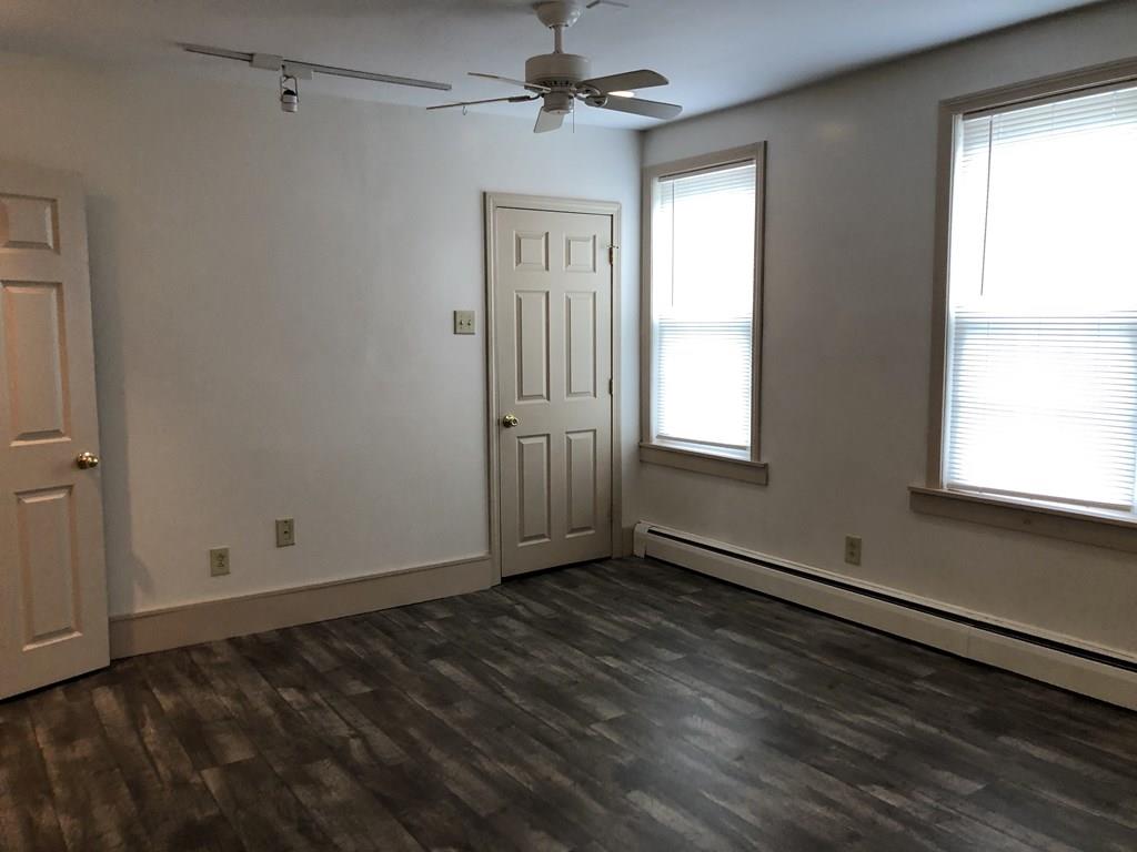 25 Baker Street Gardner, MA 01440 - Photo 17 of 26 a view of an empty room with a window