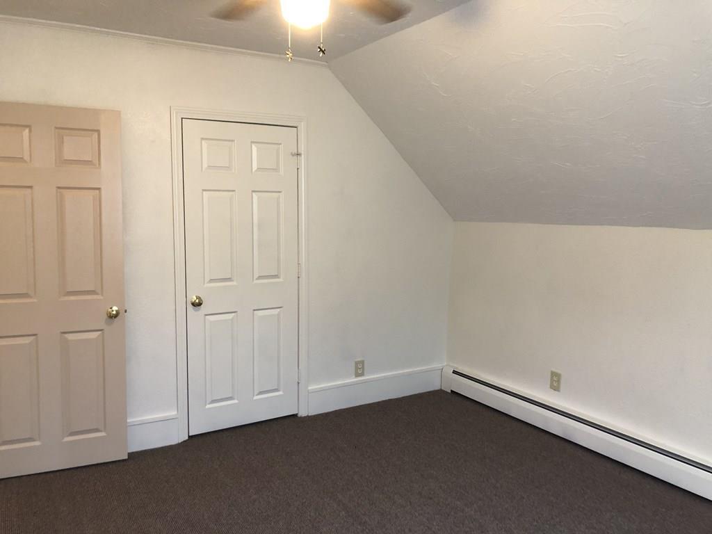 25 Baker Street Gardner, MA 01440 - Photo 24 of 26 an empty room with an entryway
