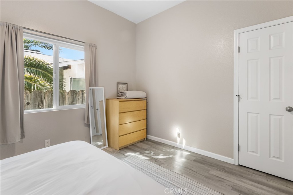 944 West 18th Street Merced, CA 95340 - Photo 13 of 34 a bedroom with a bed and a window