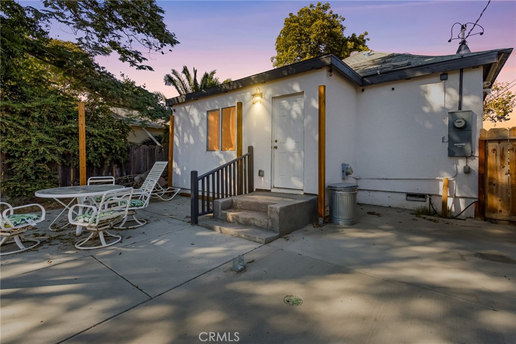 944 West 18th Street Merced, CA 95340 - Photo 23 of 34 a view of a house with backyard and sitting area
