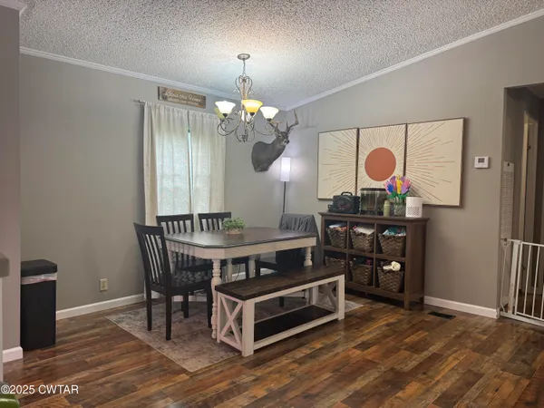 a view of a kitchen with a sink