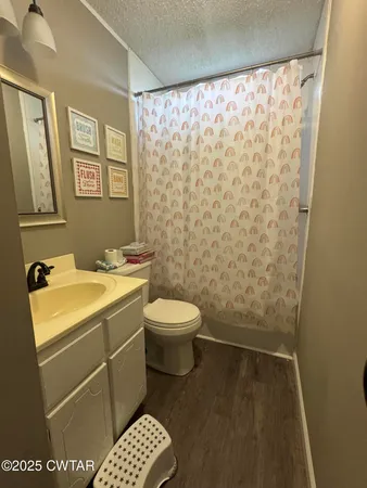 a bathroom with a sink and a bathtub