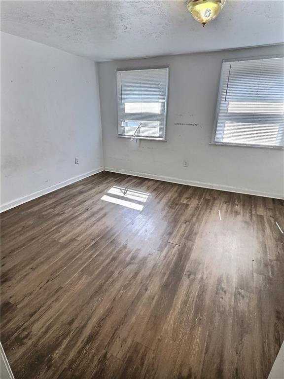 603 West Main Street Carnegie, PA 15106 - Photo 15 of 35 wooden floor in an empty room with a window