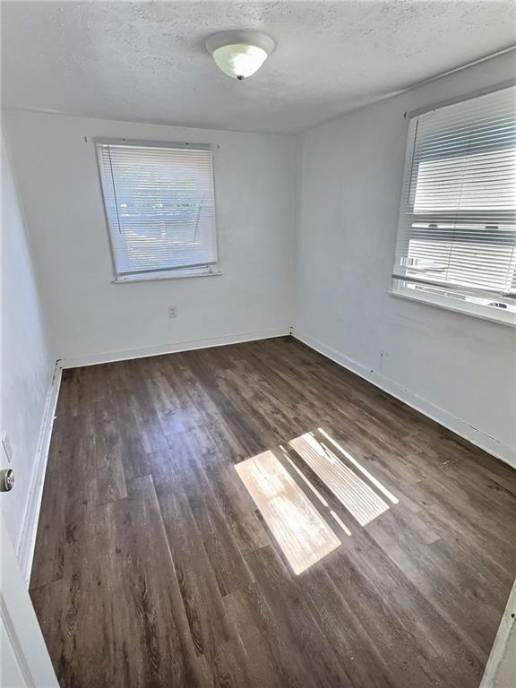 603 West Main Street Carnegie, PA 15106 - Photo 18 of 35 an empty room with wooden floor and windows