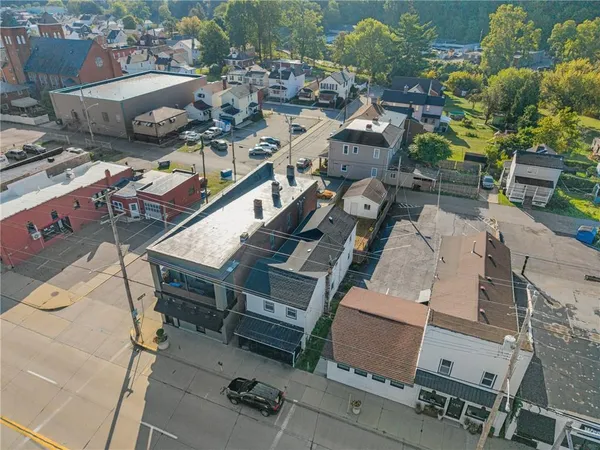 an aerial view of a building with outdoor space