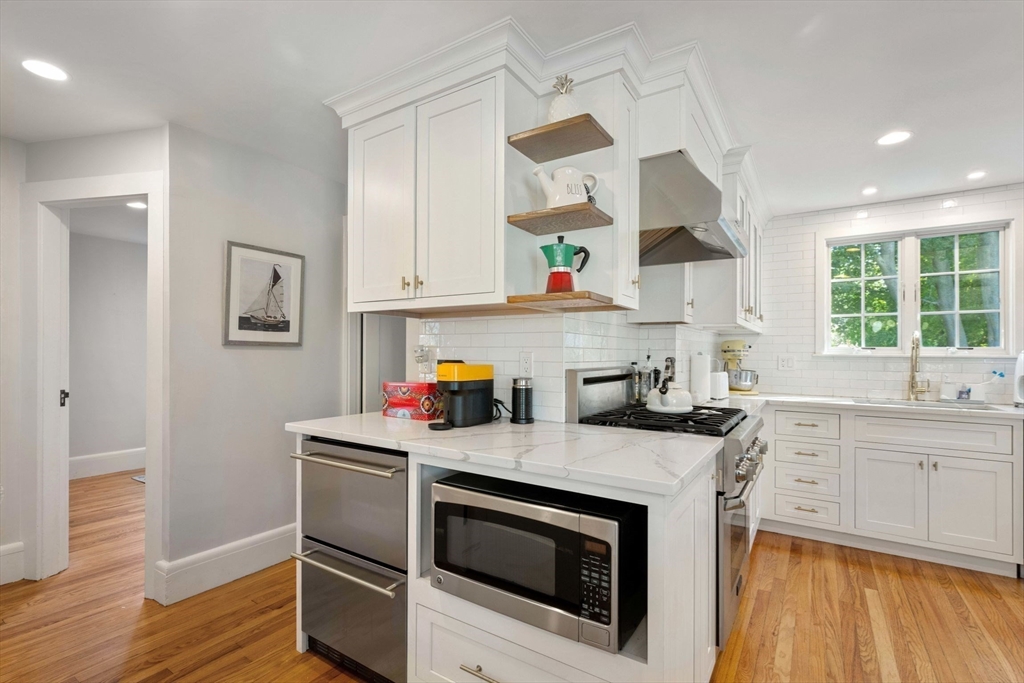 8 Old Salem Road Marblehead, MA 01945 - Photo 12 of 34 a kitchen with granite countertop a sink stainless steel appliances and cabinets